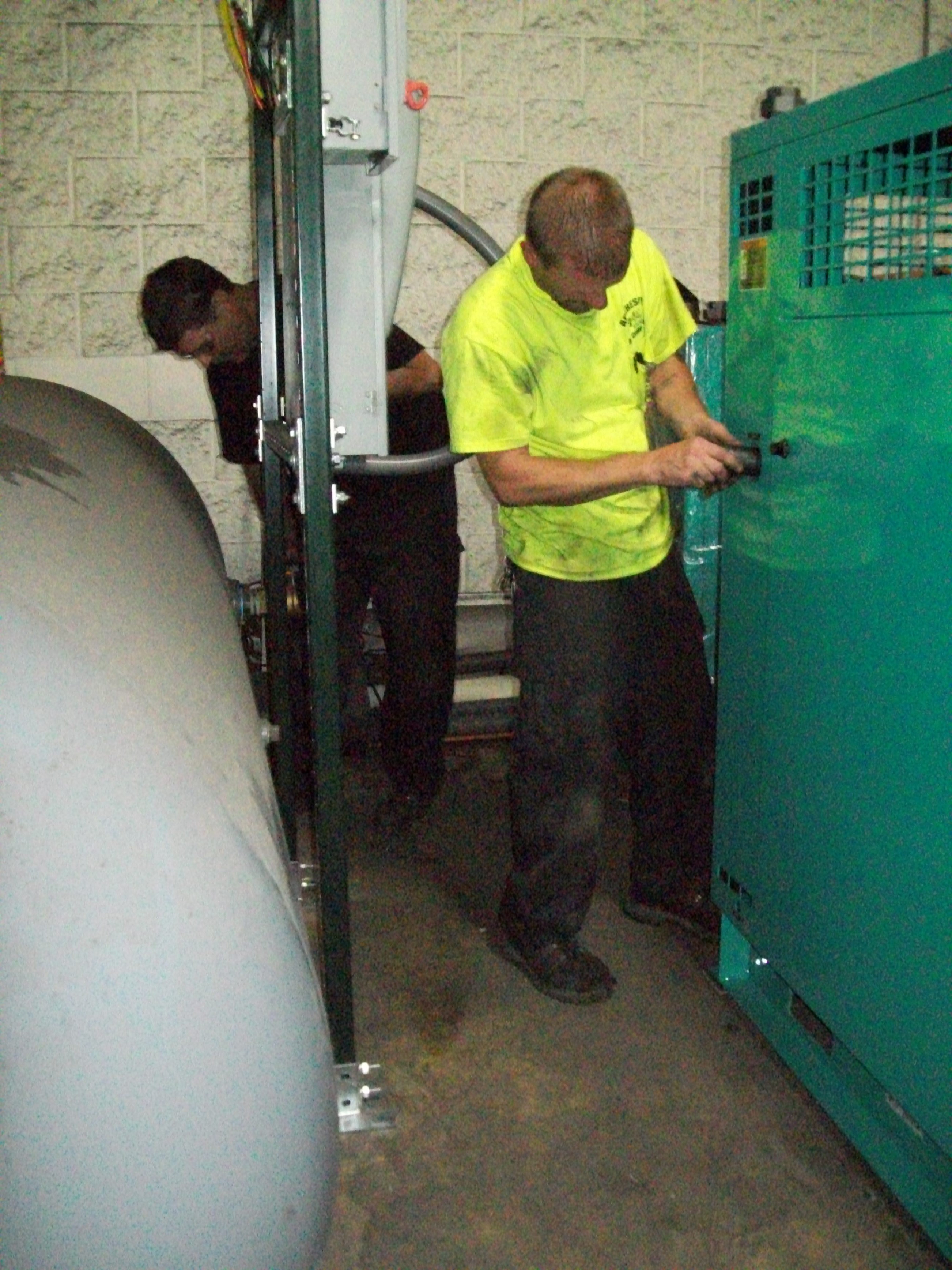 installing a sullivan palatek SP16-75HP rotary screw air compressor at mezzanine location